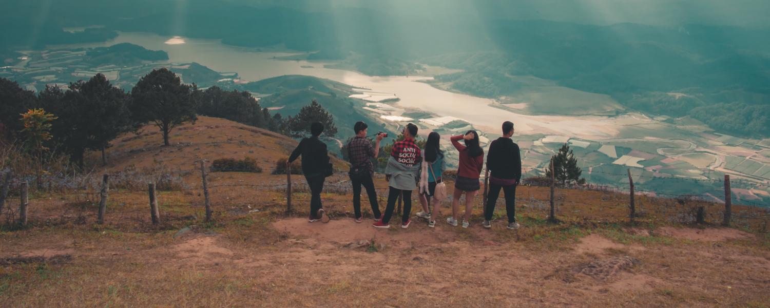 Group of friends at top of mountain