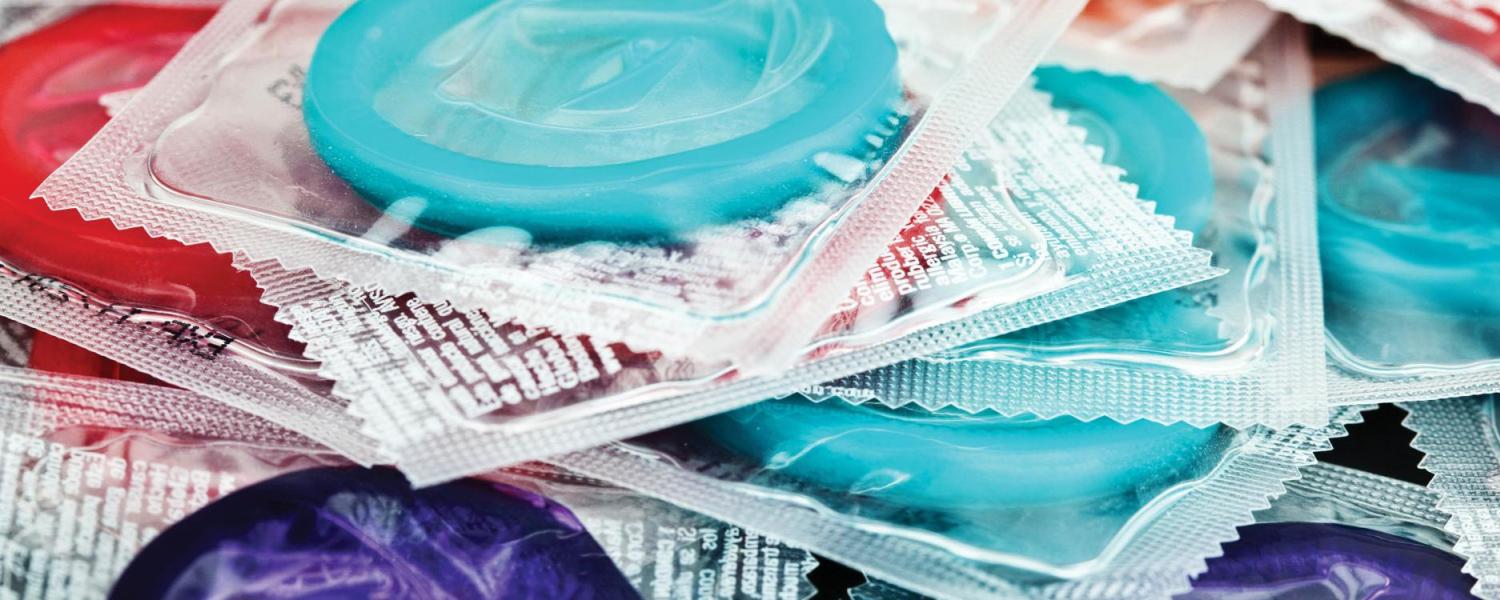 Colorful condoms in wrappers