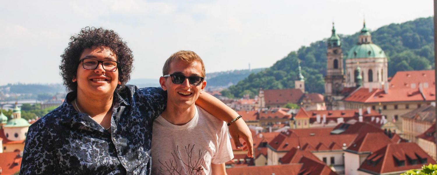 Two students pose for a photo in Prague.