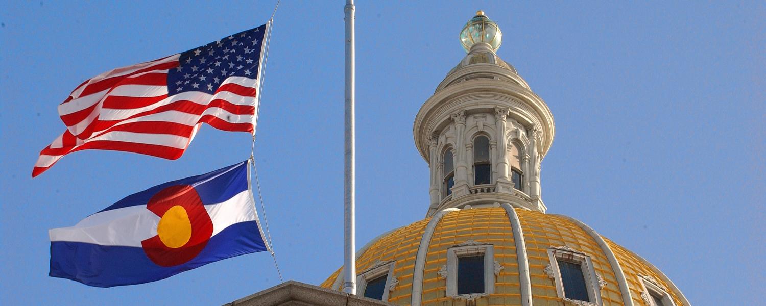 U.S. flag and Colorado state flag