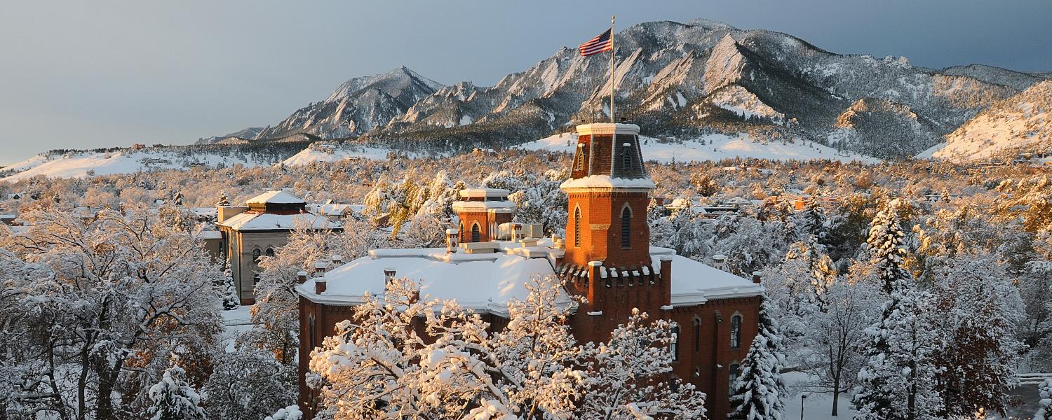 Old Main building covered in snow