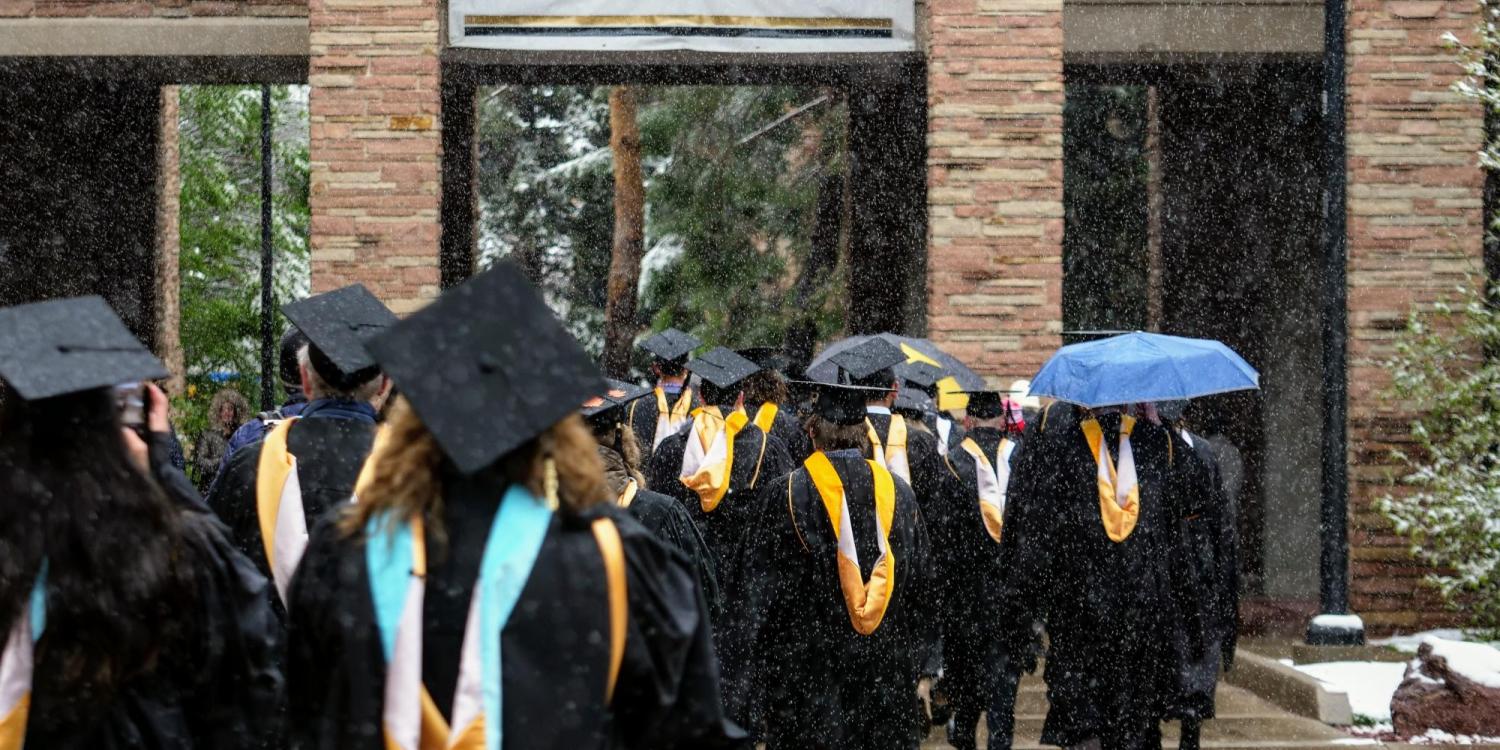 Graduates line up for commencement procession