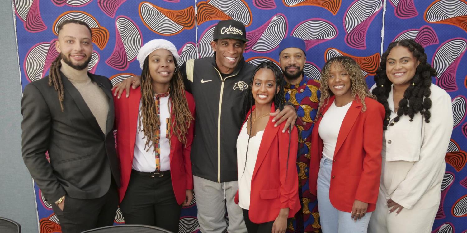 CAAAS staff pose with founder and director Reiland Rabaka and Deion 'Coach Prime' Sanders