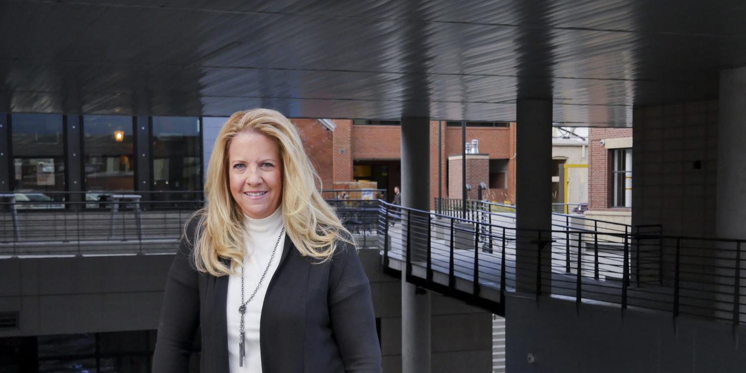 Cynthia Banks poses in front of The Hub in downtown Boulder