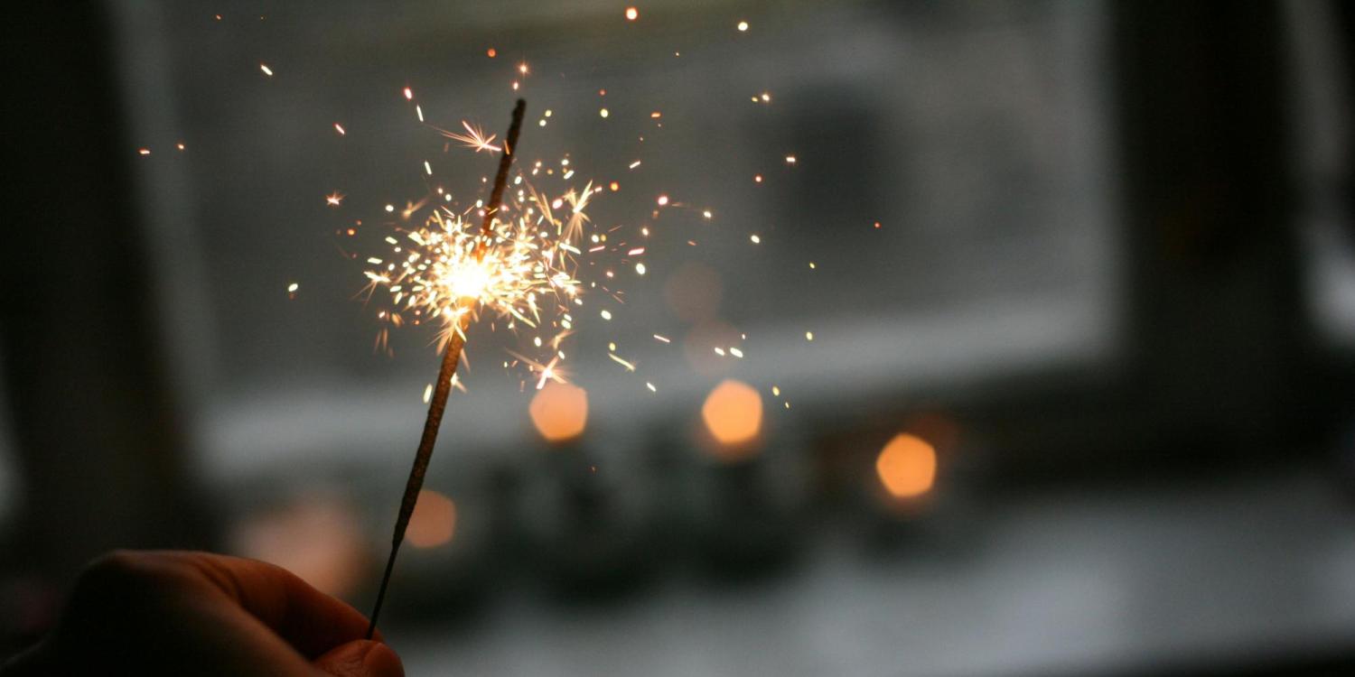 Someone holding a small sparkler