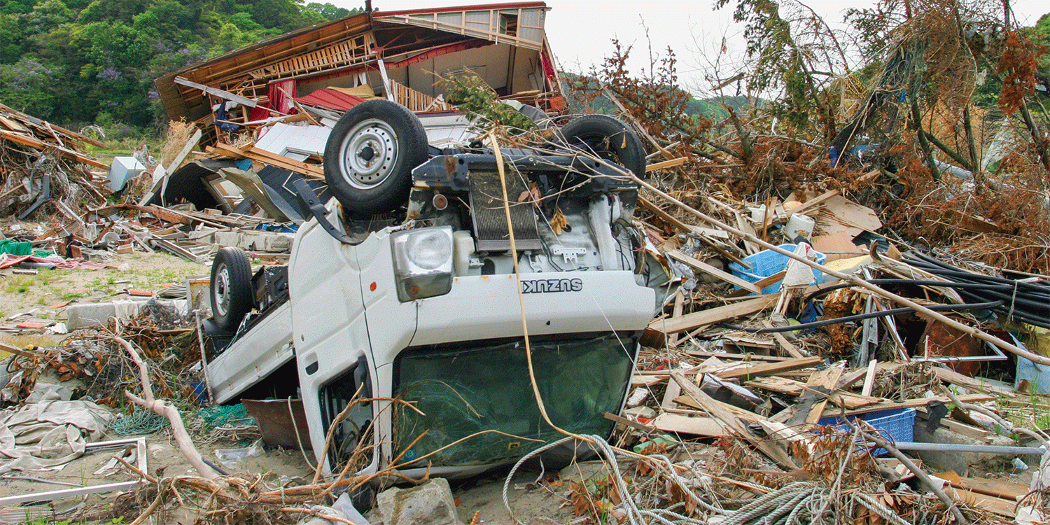 Car overturned in earthquake aftermath