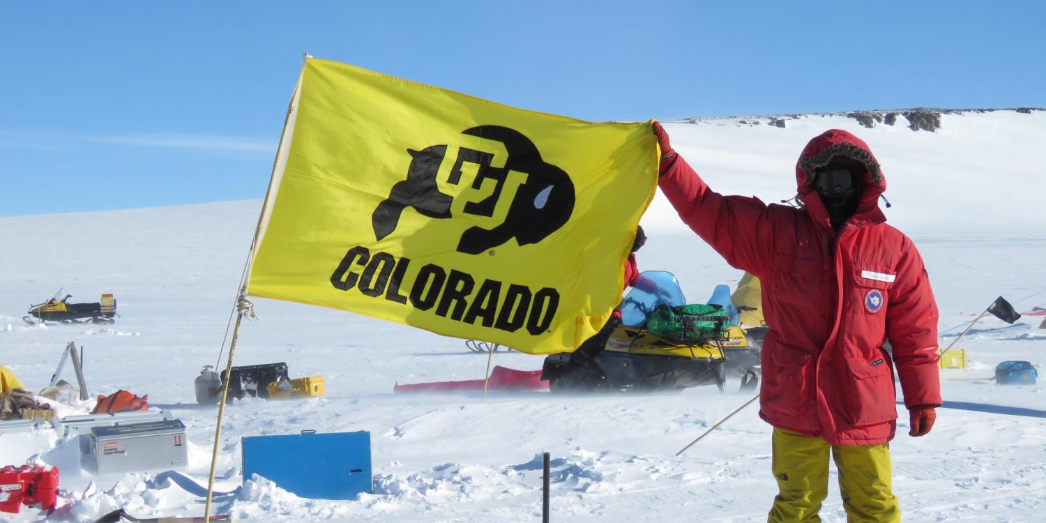 Brian Hynek with CU Boulder flag