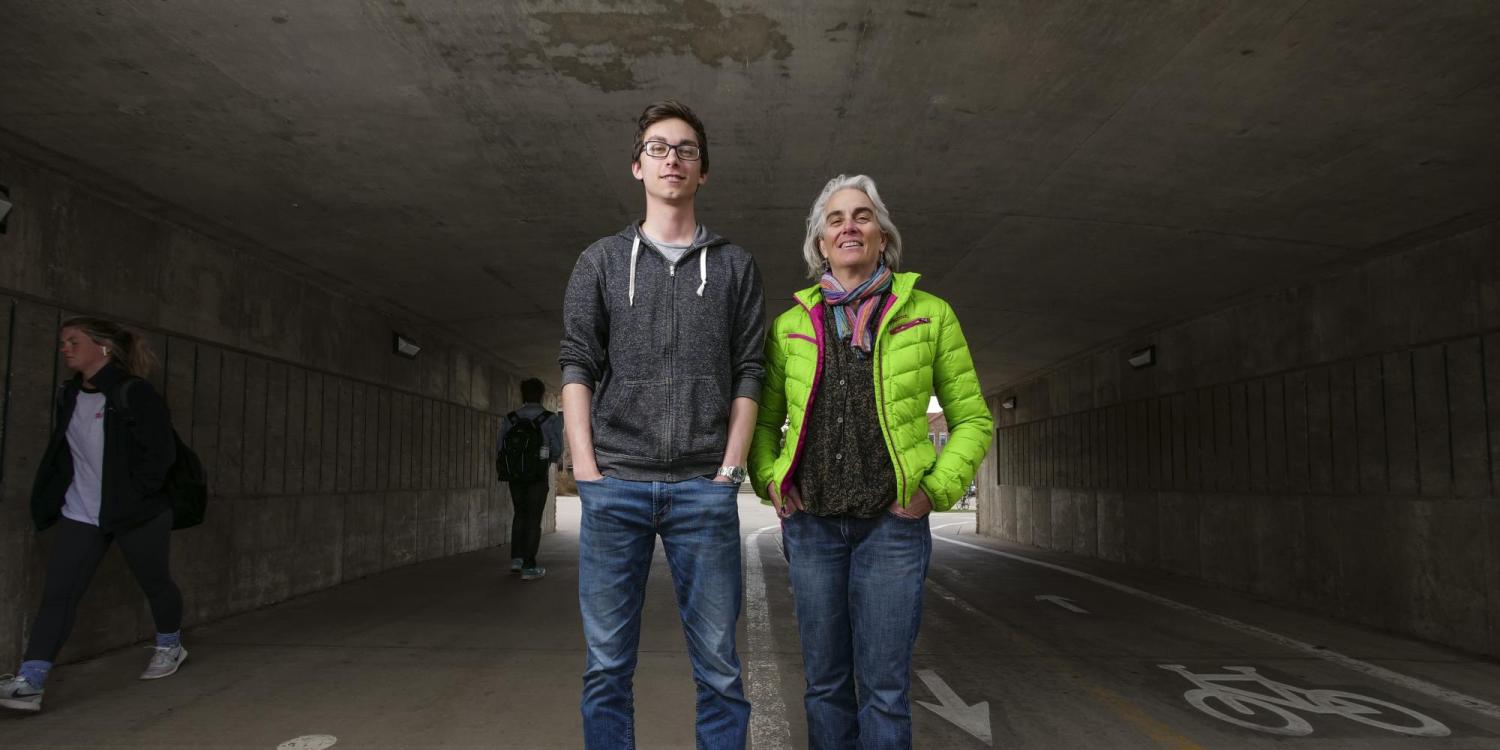 Instructor Martha Russo and student Sam Jones pose for a photo in the Regent underpass