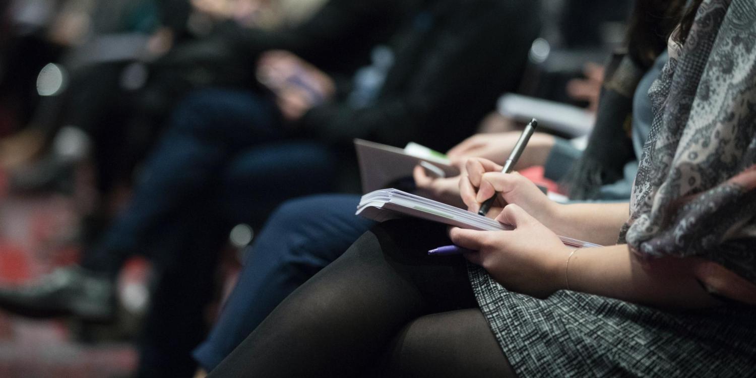 journalists taking notes