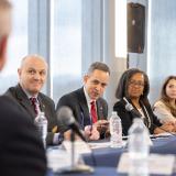 Massimo Ruzzene participates in a roundtable discussion on commerce.