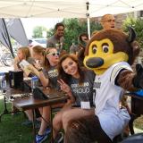 Student volunteers pose for a photo with Chip during move-in 2016