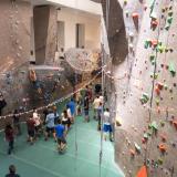students socialize at climbing gym event in Rec Center in 2018