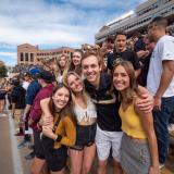 Students pose for photo at 2018 homecoming game