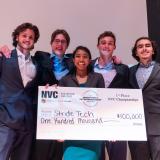 New Venture Challenge finalists pose with a giant prize check