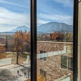 view campus and the Flatirons from inside a building