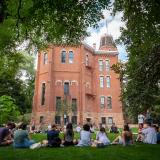 Students enjoying class outside on the first day of classes.
