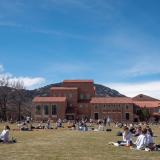 students enjoying a spring day on Norlin Quad