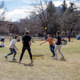 Students playing a game on Norlin Quad