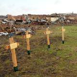 Crosses on the lawn in front of plaza towers elementary school