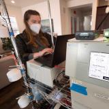 Avery Hatch monitoring air quality in a home spared by the Marshall Fire