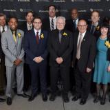 Chancellor poses for photo with alumni award recipients