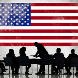 American flag with silhouettes of business people working