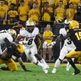 Colorado running the football against Arizona State