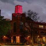 The ATLAS Building towers shines red to honor Coloradans lost to COVID-19 on Friday, May 15, 2020. (Photo by Casey A. Cass/University of Colorado)
