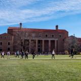 Students walk across Norlin Quad