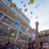 Students release biodegradable balloons as part of class project