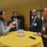 Faculty members mingle at the inaugural Faculty Awards Celebration.