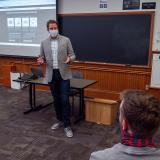 professor teaching while wearing mask 