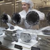 Geologist Carolyn Crow investigating moon rocks at NASA's Johnson Space Center in Houston.