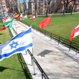 International flags lined up for the annual Conference on World Affairs at CU Boulder