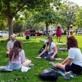 Students sitting in a circle and talking