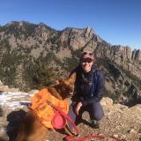 Emily Kibby and her dog on a hike