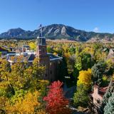 CU Boulder campus surrounded by fall colors.