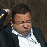 A television reporter reacts to being hit by a heat ray during a demonstration of the U.S. military’s Active Denial System.