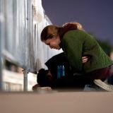 A woman cries while kneeling in front of the U.S. Supreme Court in Washington, D.C., on May 2