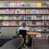 student studying in a library