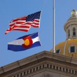U.S. flag and Colorado state flag