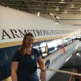 Jessica Gilman in front of a research plane