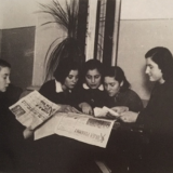 Girls reading Yiddish and Polish newspaper in the 1930s