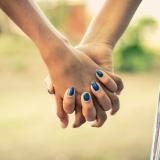 Two girls holding hands