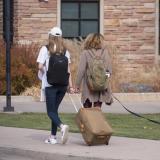 CU Boulder students (and dog) leave for break