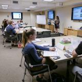 Employees attend an HR workshop