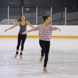 Students ice skating in the Rec Center on campus