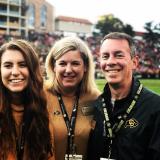 CU Boulder’s Dean of Engineering and Applied Science Bobby Braun, his wife Karen, and his daughter attend a CU football game in the fall of 2018.
