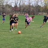 CU Boulder students playing soccer.