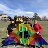 Chip the buffalo mascot and Integrated Teaching and Learning Lab team members pose with a kite